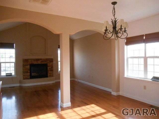 2264 L Road Grand Junction, CO 81505 - Photo 5 of 20 a view of wooden floor and a chandelier in a room