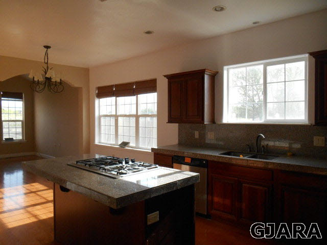 2264 L Road Grand Junction, CO 81505 - Photo 8 of 20 a kitchen with a sink and a stove