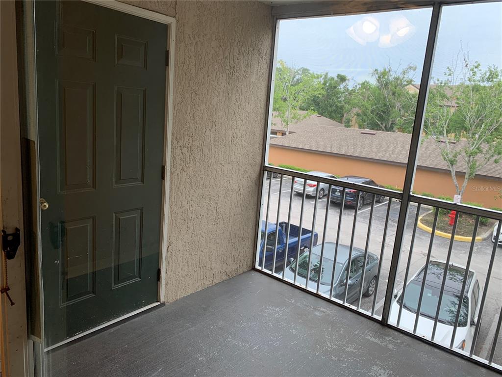 8800 Latrec Avenue, Unit 9203 Orlando, FL 32819 - Photo 2 of 8 a view of a balcony