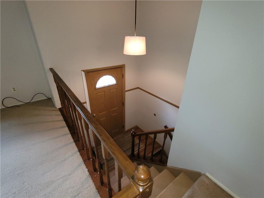 129 Crosslands Road Butler, PA 16002 - Photo 8 of 25 a view of entryway and hall with wooden floor