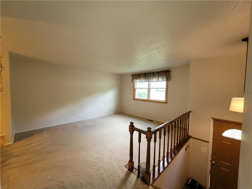129 Crosslands Road Butler, PA 16002 - Photo 9 of 25 a view of livingroom and stairs