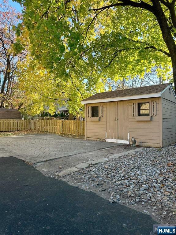 678 Grove Street Ridgewood, NJ 07450 - Photo 13 of 14 a front view of a house with a yard