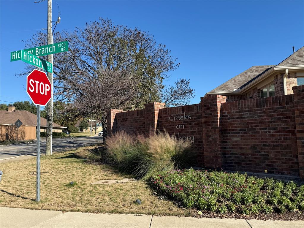 8089 Rabbit Drive Frisco, TX 75034 - Photo 12 of 37 Community / neighborhood sign with a yard