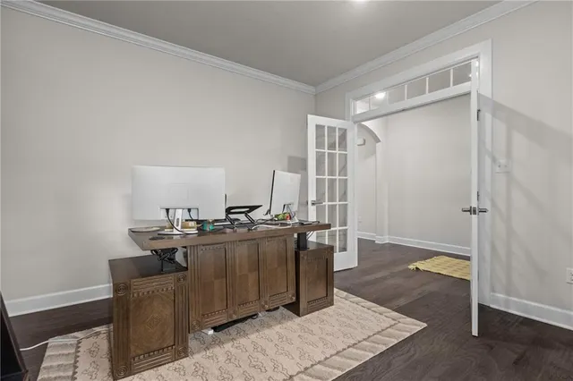 a workspace with furniture and window