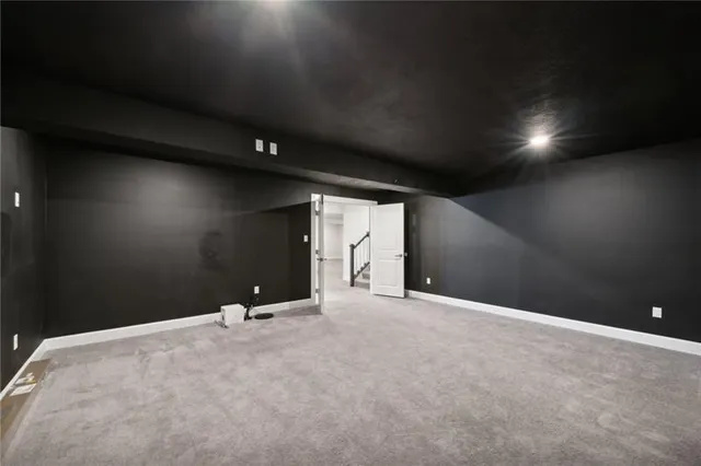 a front view of a house with a yard table and chairs