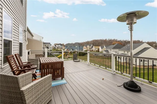 a view of balcony with furniture