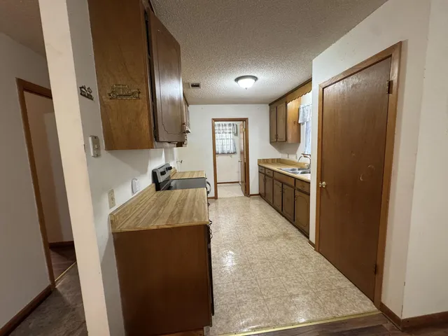 a bathroom with a toilet and a bathtub
