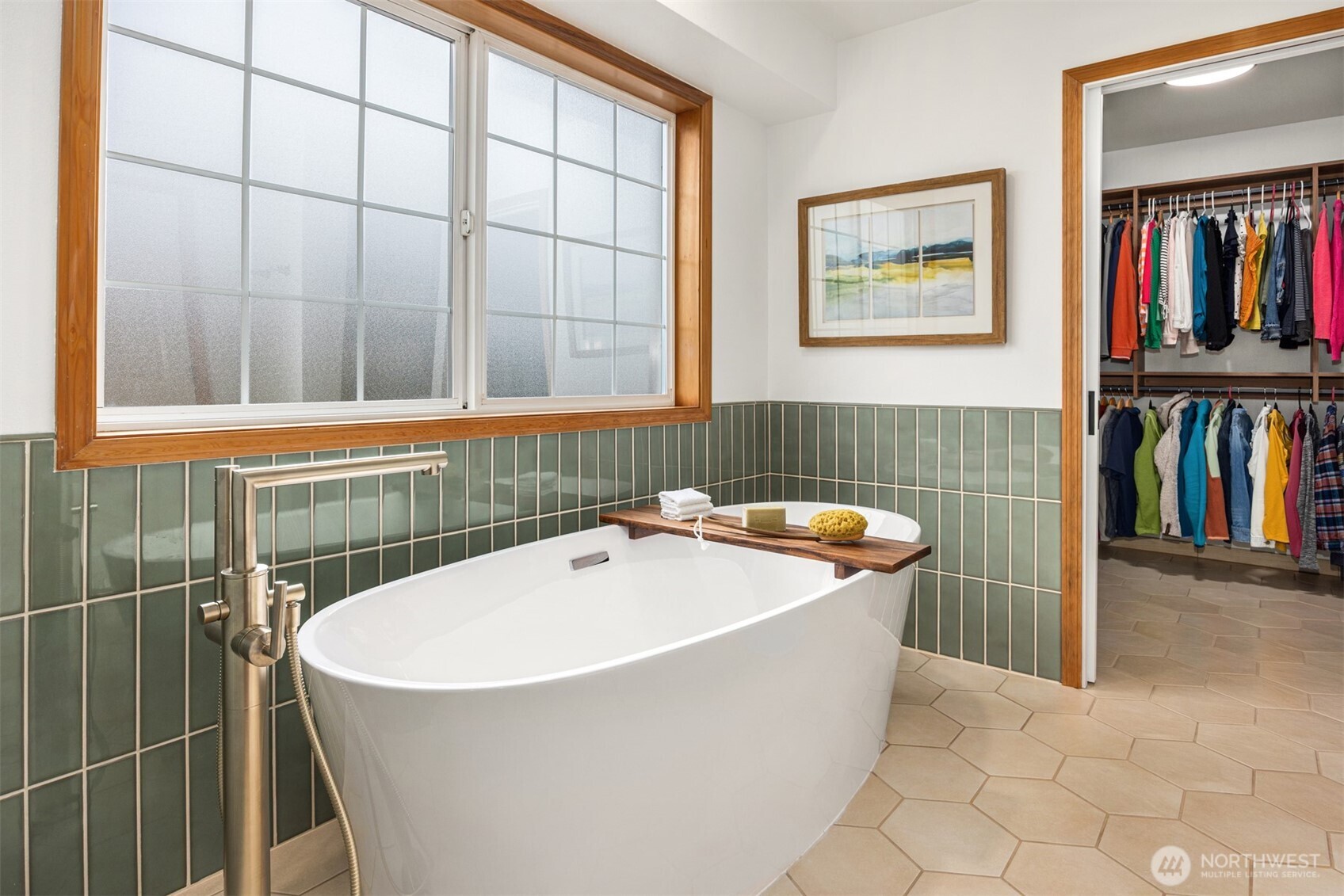 2714 182nd Place Southeast Bothell, WA 98012 - Photo 21 of 36 a bathroom with a bathtub and a window
