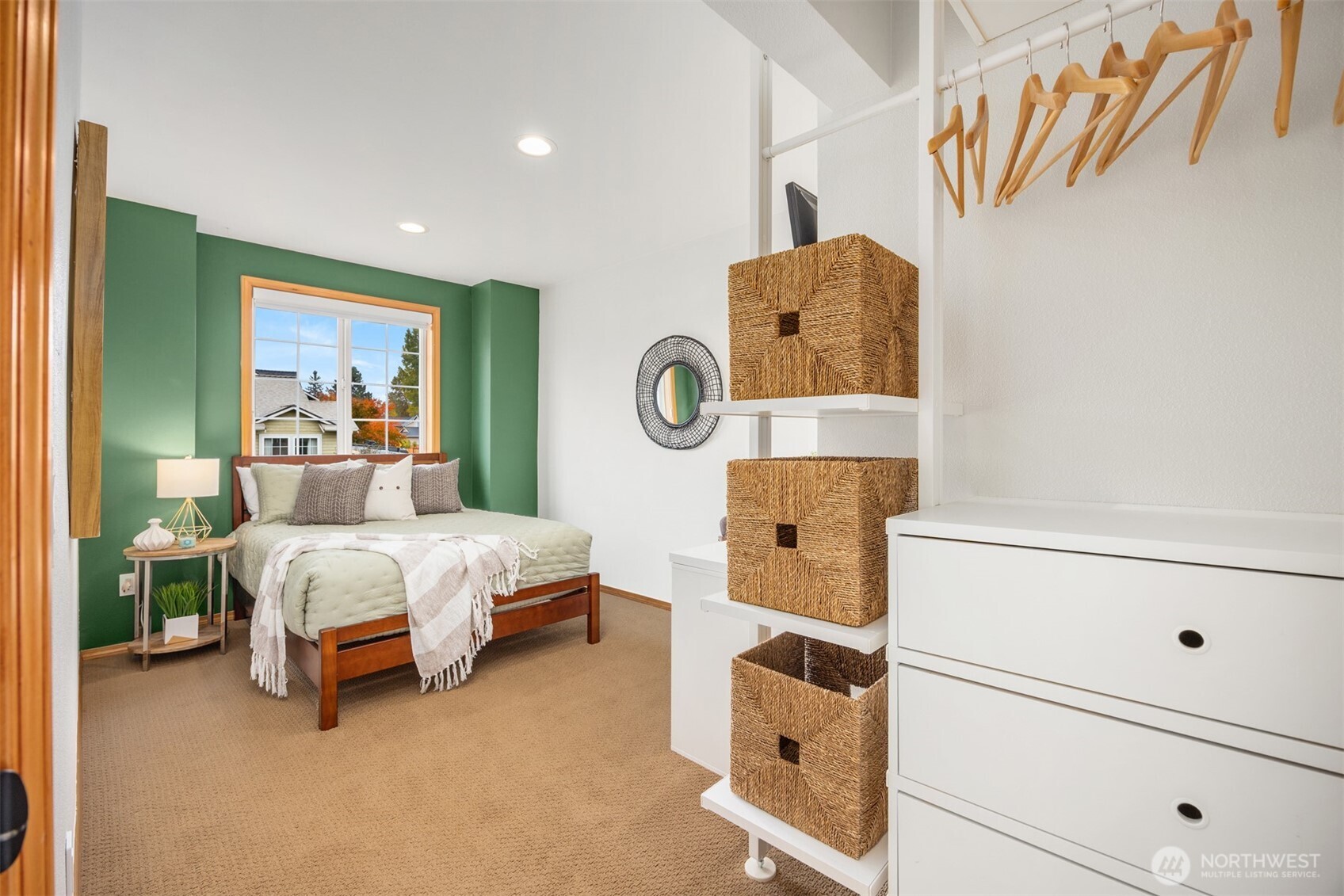 2714 182nd Place Southeast Bothell, WA 98012 - Photo 23 of 36 a bedroom with a bed and lamp