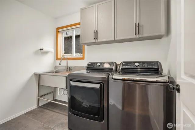 a kitchen with a stove and a sink
