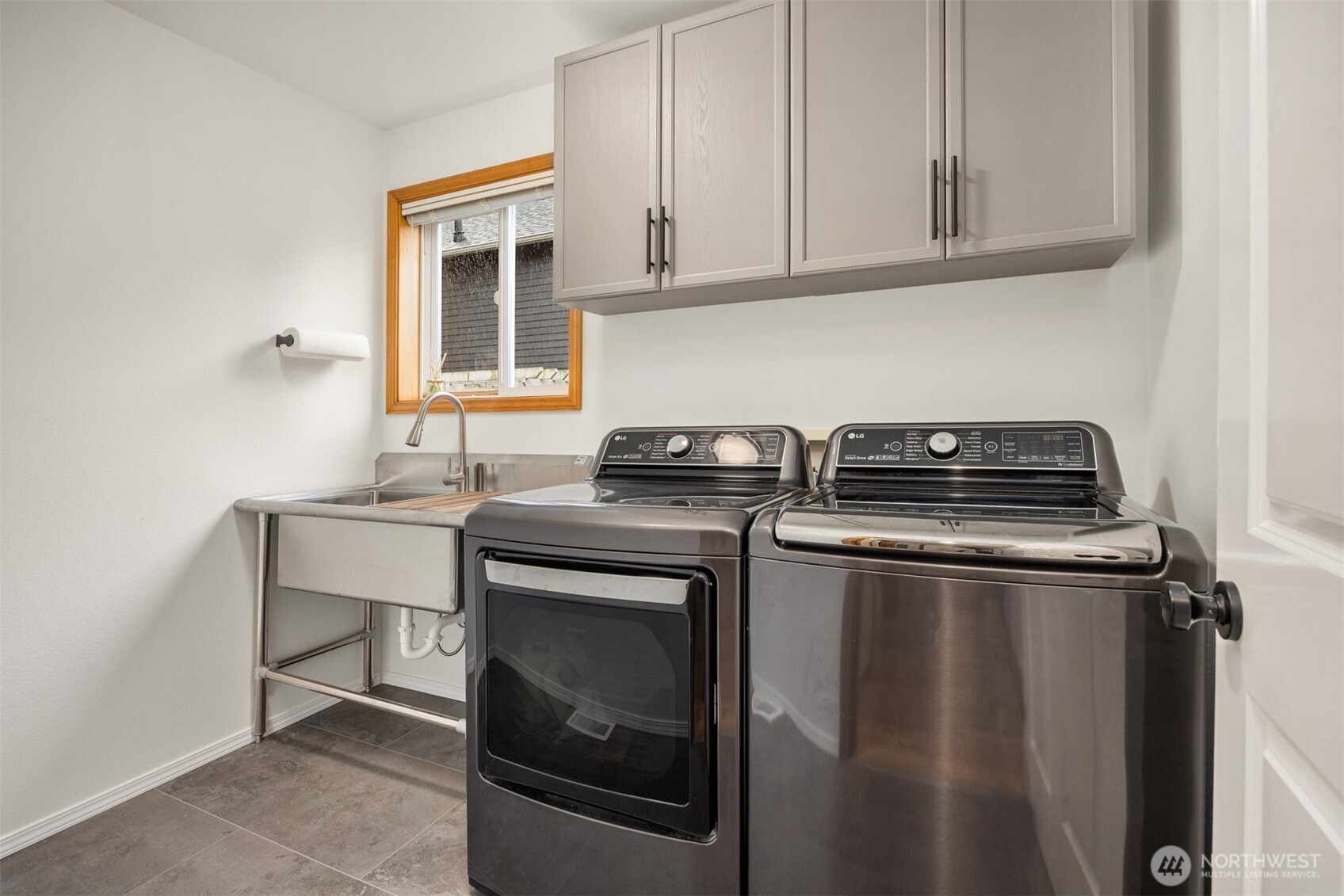 2714 182nd Place Southeast Bothell, WA 98012 - Photo 27 of 36 a kitchen with a stove and a sink
