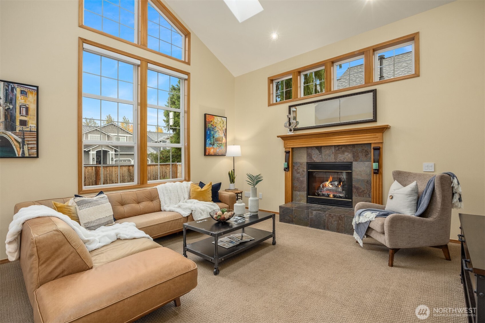 2714 182nd Place Southeast Bothell, WA 98012 - Photo 3 of 36 a living room with furniture and a fireplace