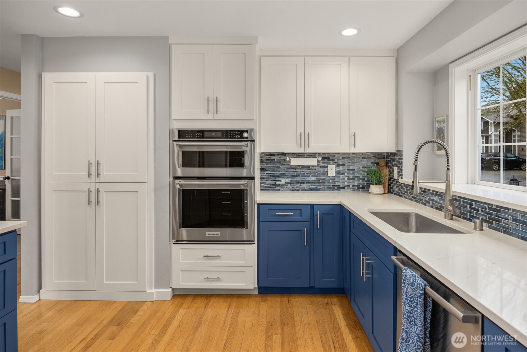 2714 182nd Place Southeast Bothell, WA 98012 - Photo 10 of 36 a kitchen with stainless steel appliances a stove sink and cabinets