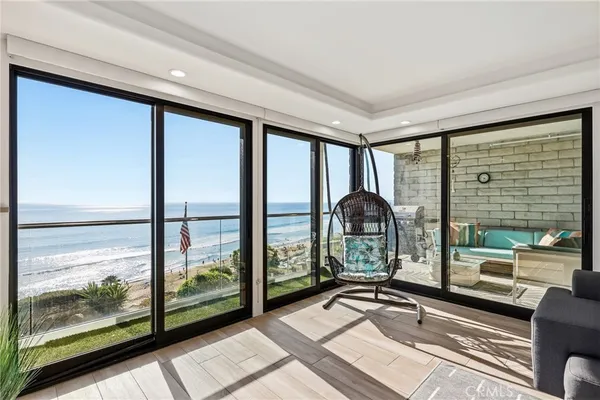 a kitchen with kitchen island a counter top space a sink stainless steel appliances and cabinets