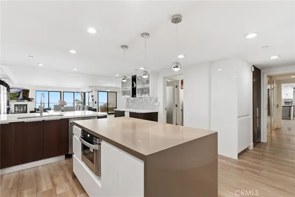 a kitchen with a stove and a sink