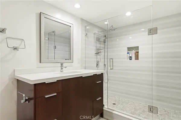 a view of a couch in wooden floor