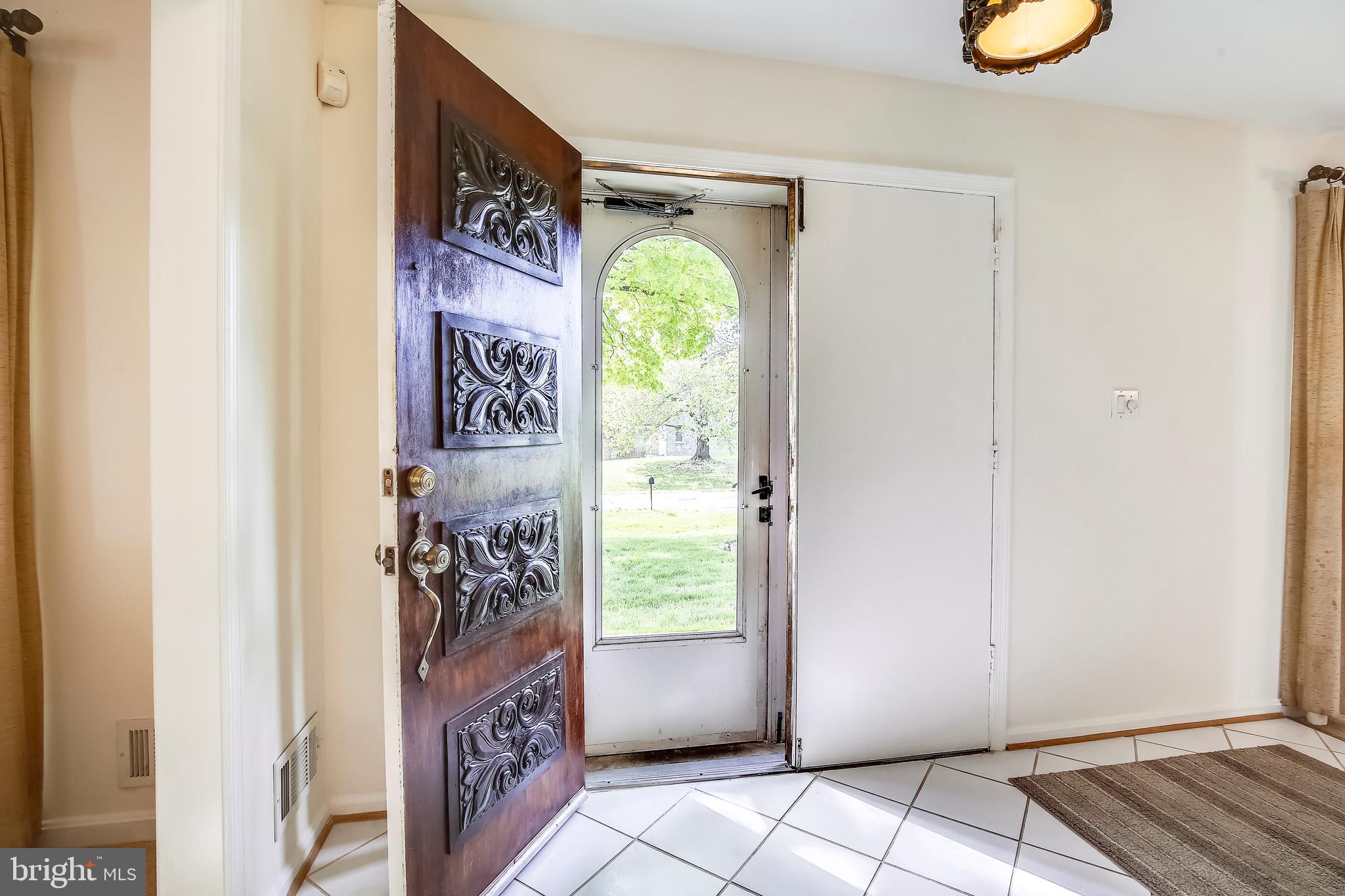 16005 Wallingford Road Silver Spring, MD 20906 - Photo 8 of 36 Entry foyer with beautiful door