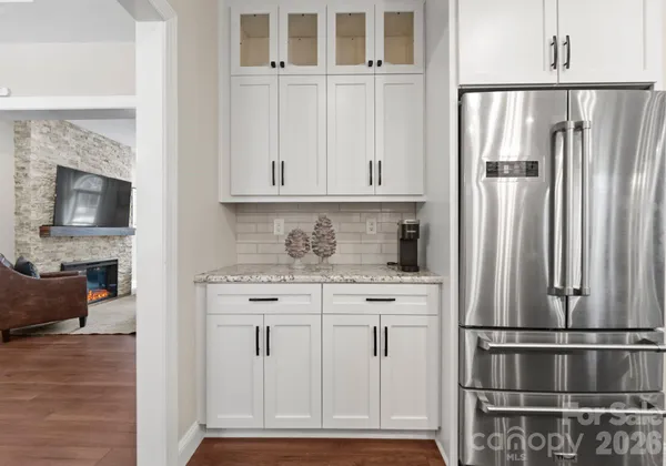 a view of cabinets a sink and a window