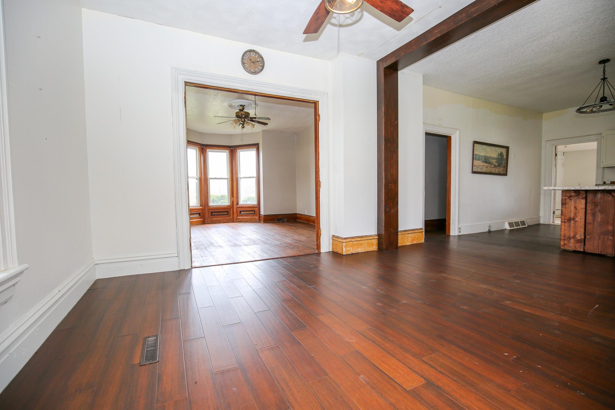 26596 Fairhaven Road Chadwick, IL 61014 - Photo 29 of 51 a view of an empty room with wooden floor and a window
