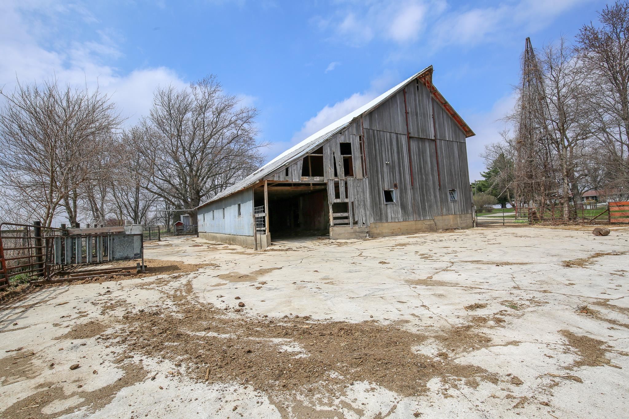 26596 Fairhaven Road Chadwick, IL 61014 - Photo 8 of 51 a view of wooden house with snow on the road