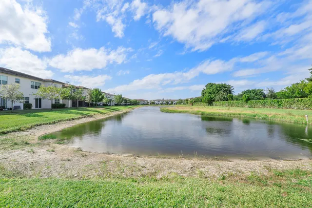 a view of a lake with a big yard