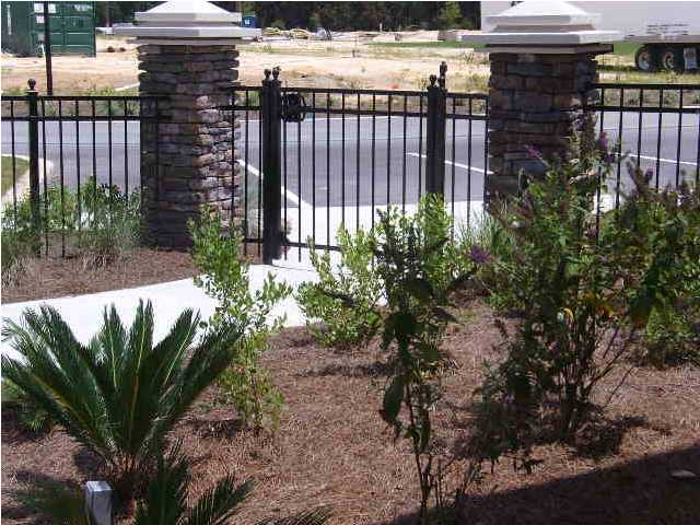 28 South Sand Palm Road, Unit 46 Freeport, FL 32439 - Photo 18 of 19 a backyard of a house with lots of green space