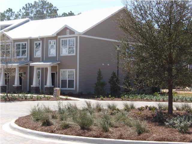 28 South Sand Palm Road, Unit 46 Freeport, FL 32439 - Photo 3 of 19 a front view of house with yard