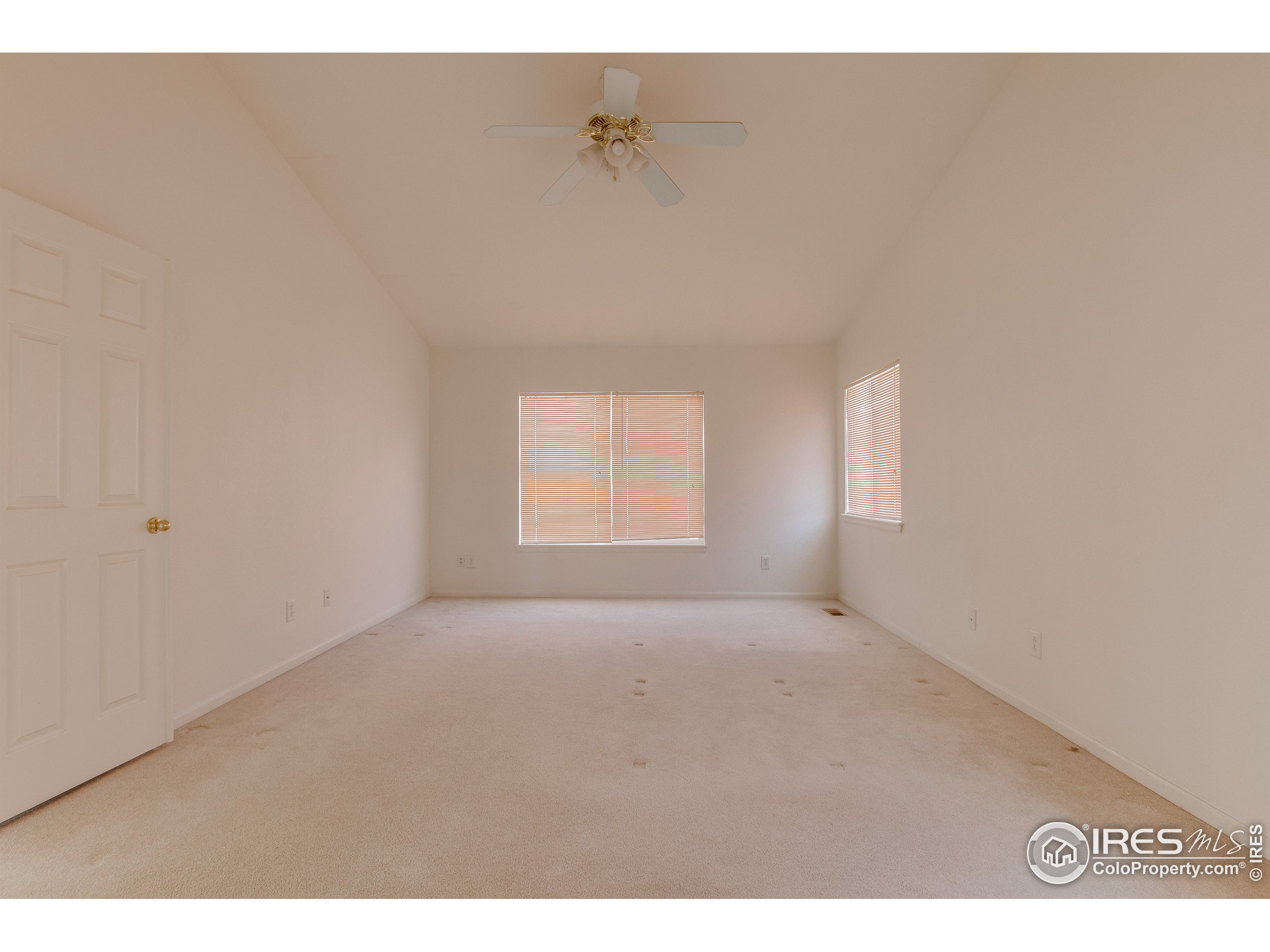 6808 Silverleaf Avenue Firestone, CO 80504 - Photo 17 of 40 a view of an empty room with a window