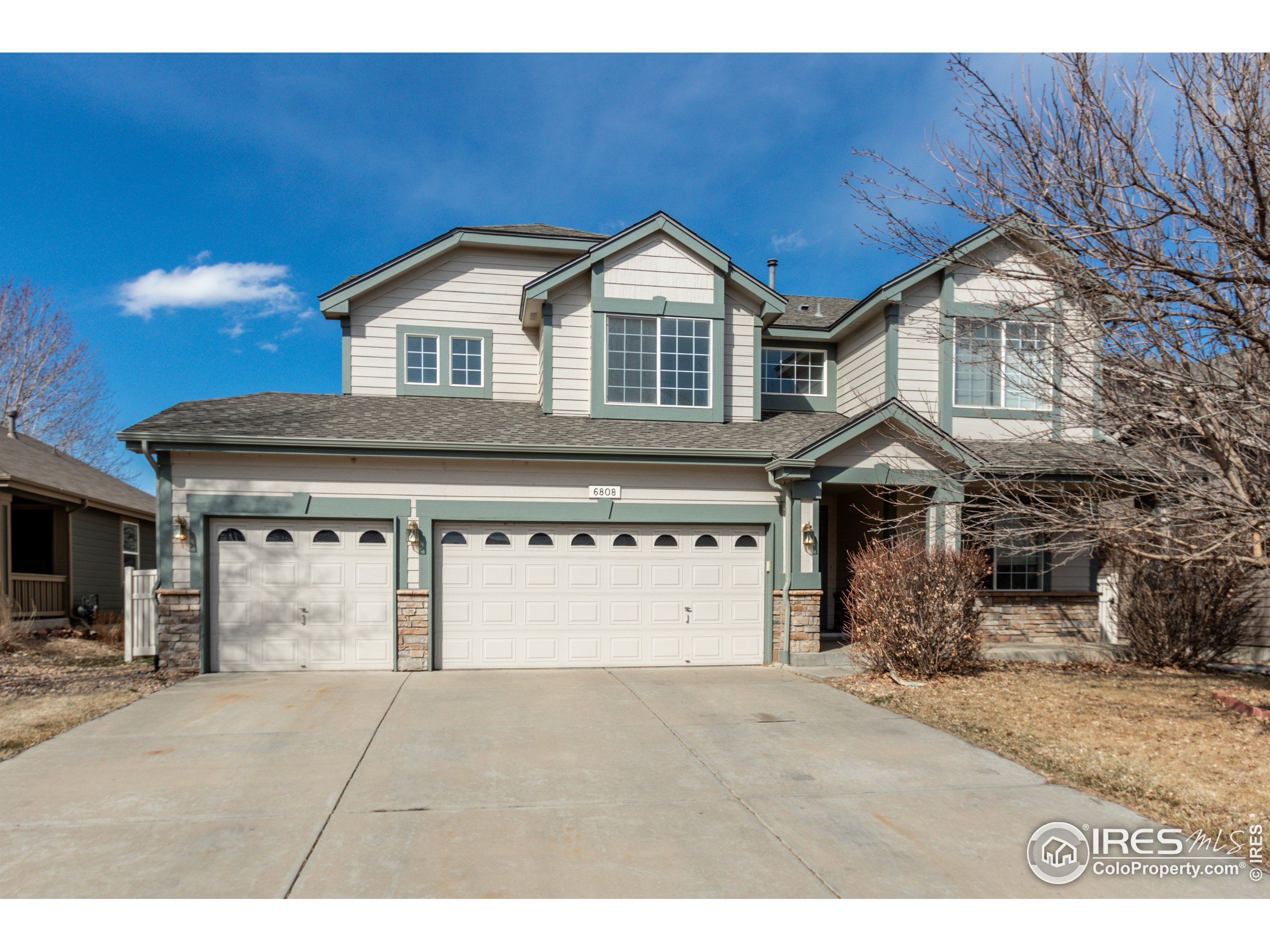 6808 Silverleaf Avenue Firestone, CO 80504 - Photo 2 of 40 a view of a house with a yard