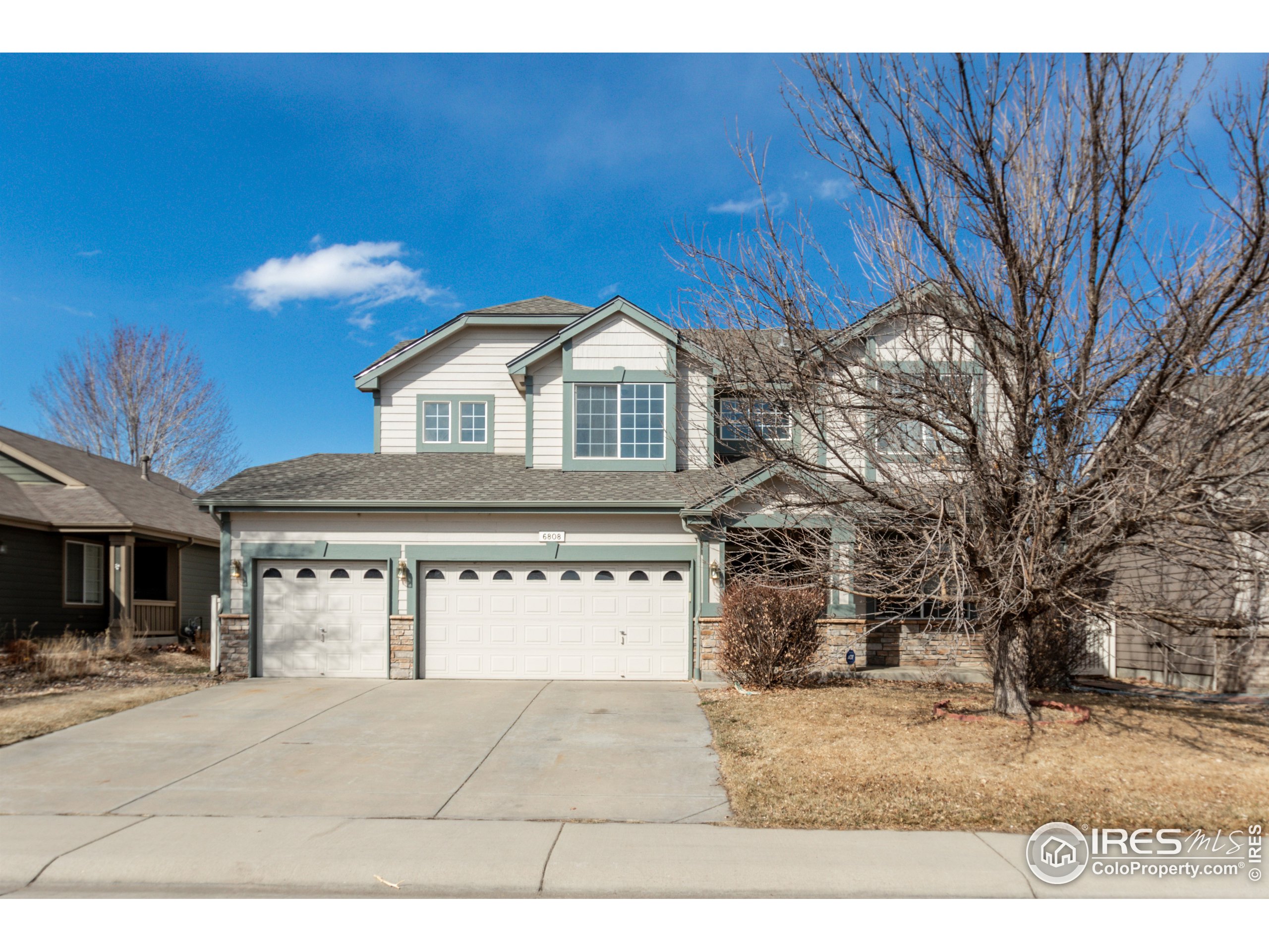 6808 Silverleaf Avenue Firestone, CO 80504 - Photo 3 of 40 a view of a house with a yard