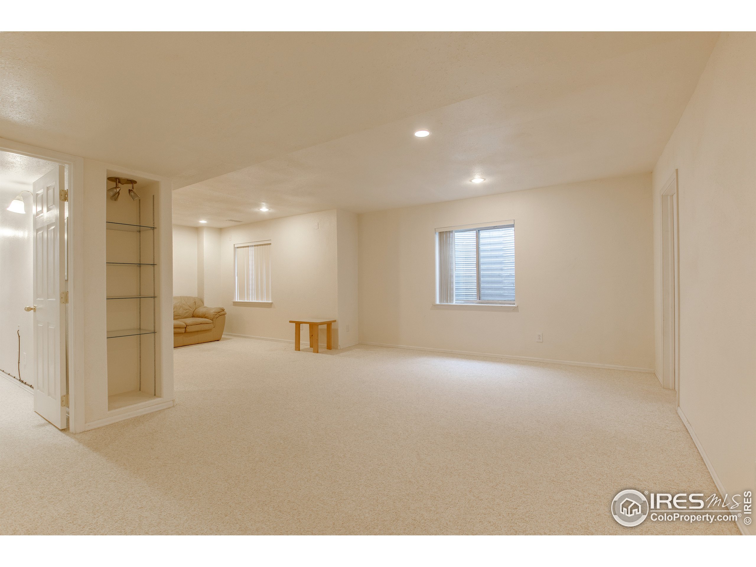 6808 Silverleaf Avenue Firestone, CO 80504 - Photo 33 of 40 a view of an empty room and a window