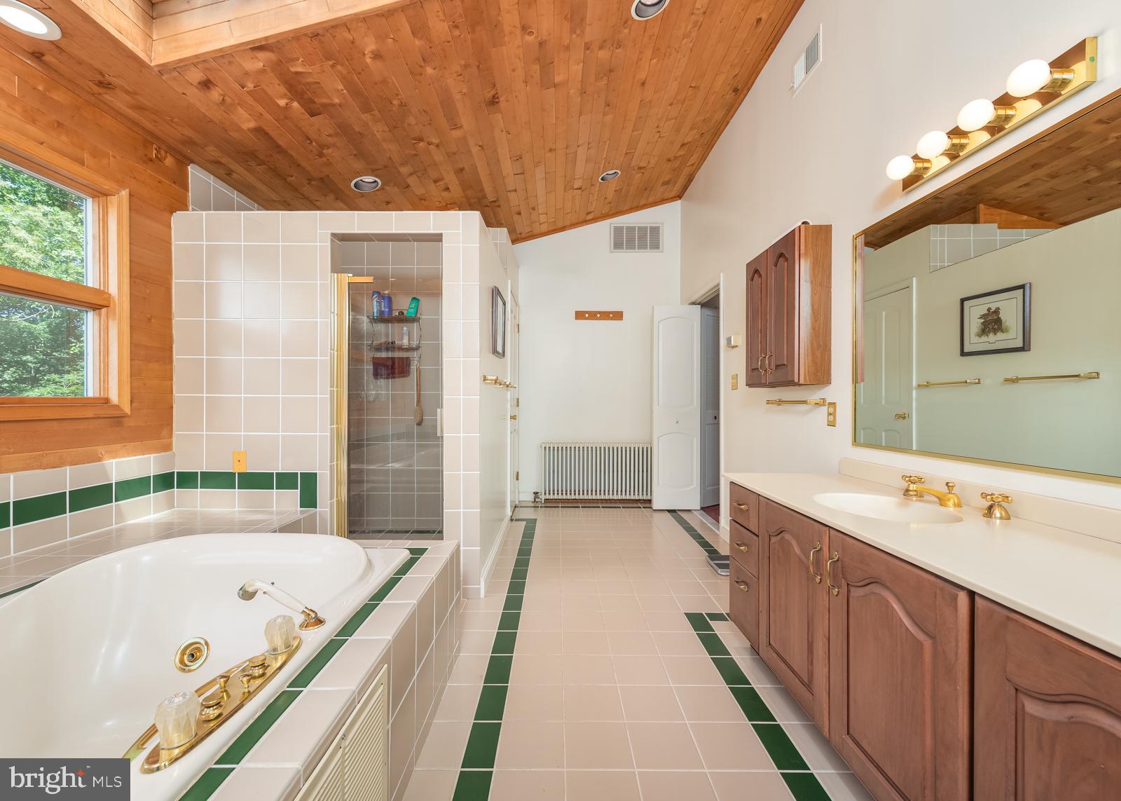 211 Patuxent Road Laurel, MD 20707 - Photo 32 of 46 Primary bathroom with separate shower &soaking tub