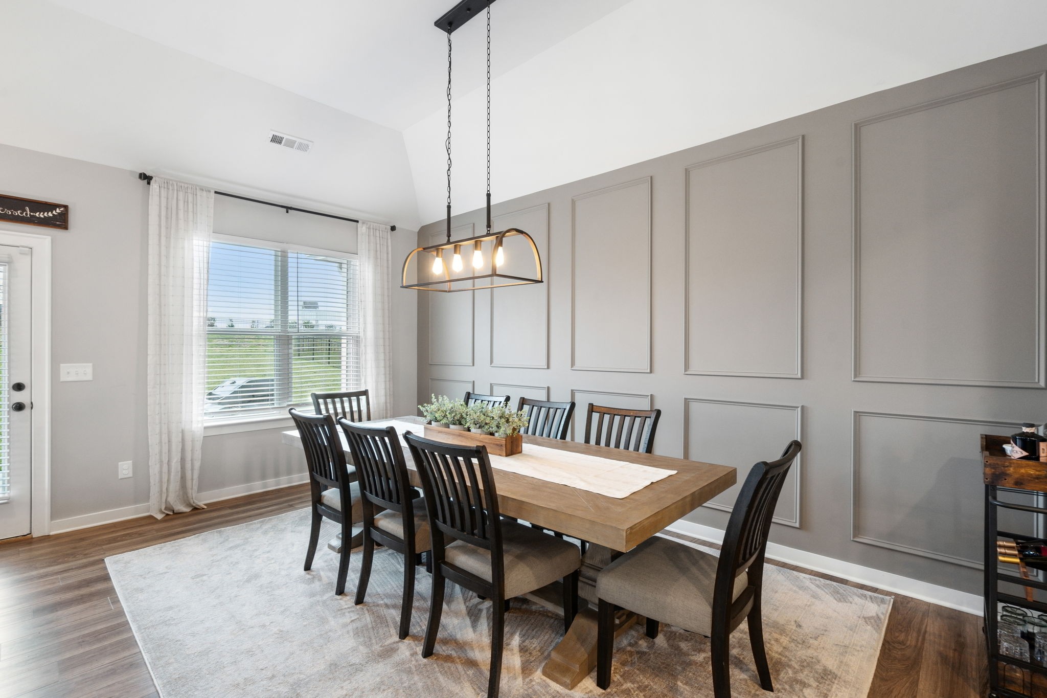 847 Plowson Road Mount Juliet, TN 37122 - Photo 13 of 56 a view of a dining room with furniture window and wooden floor
