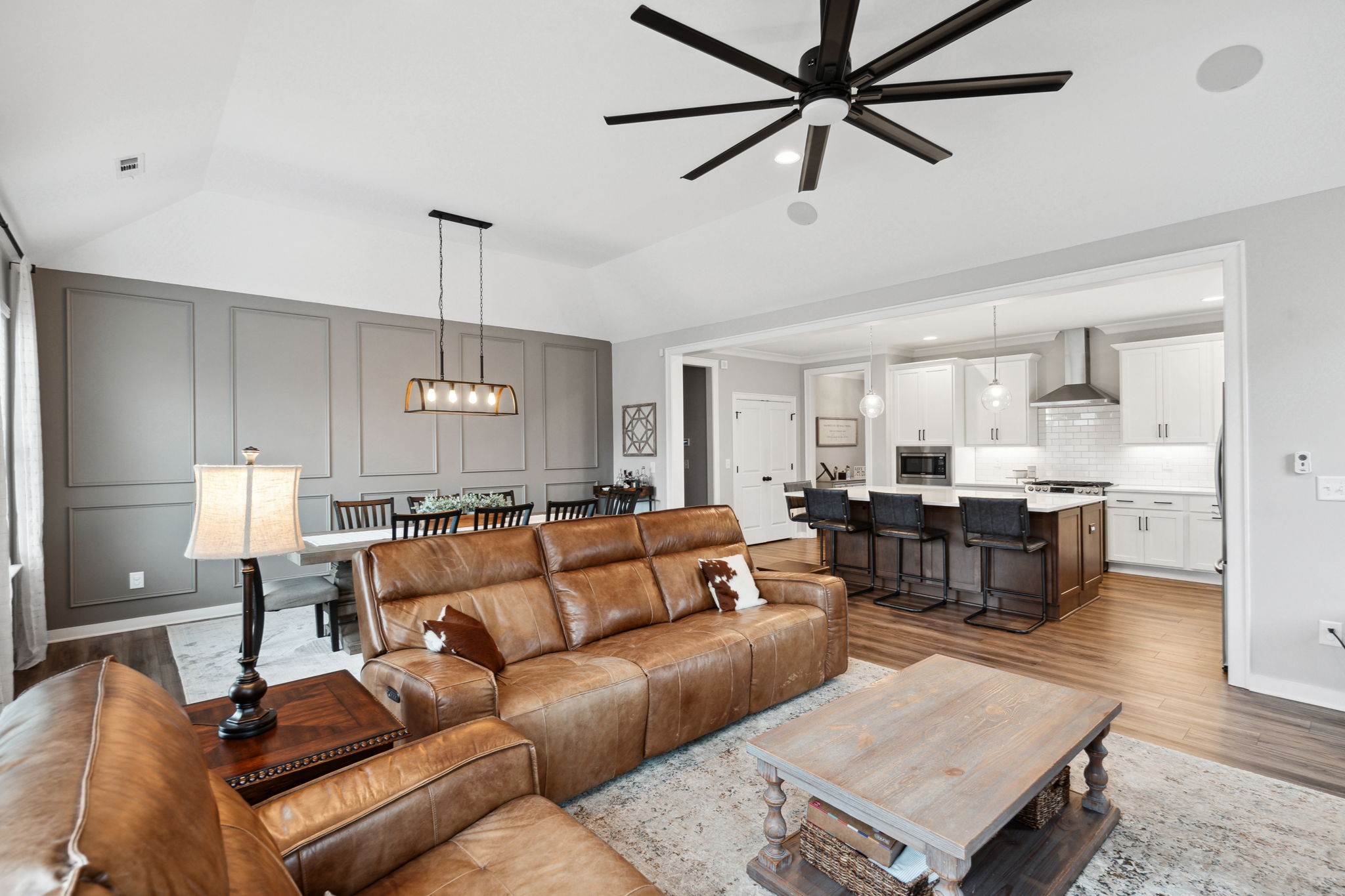 847 Plowson Road Mount Juliet, TN 37122 - Photo 15 of 56 a living room with furniture ceiling fan and a wooden floor