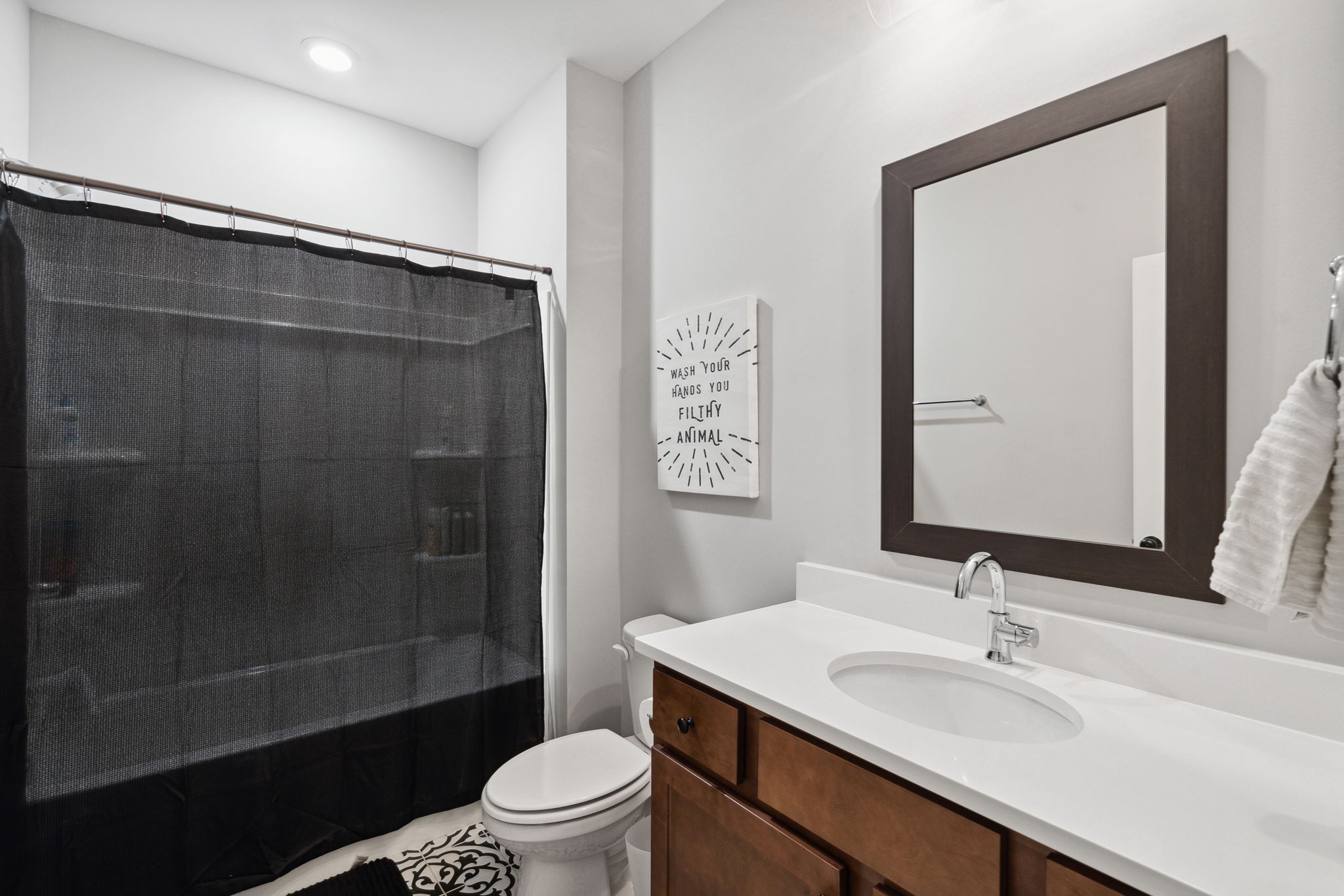 847 Plowson Road Mount Juliet, TN 37122 - Photo 18 of 56 a bathroom with a sink a toilet and shower