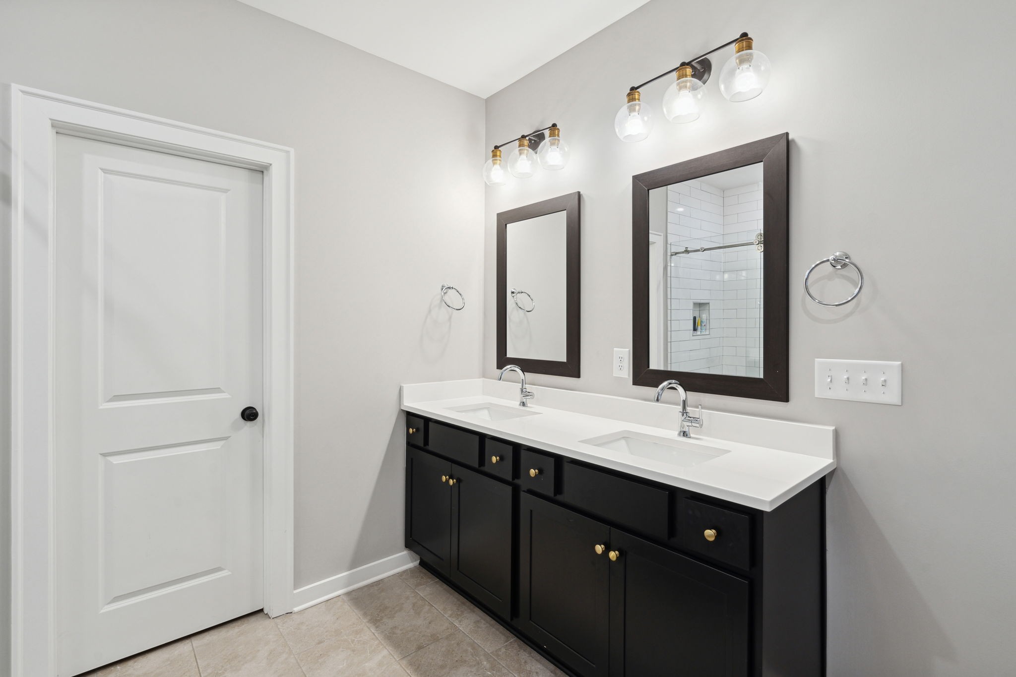 847 Plowson Road Mount Juliet, TN 37122 - Photo 21 of 56 a bathroom with a double vanity sink and a mirror