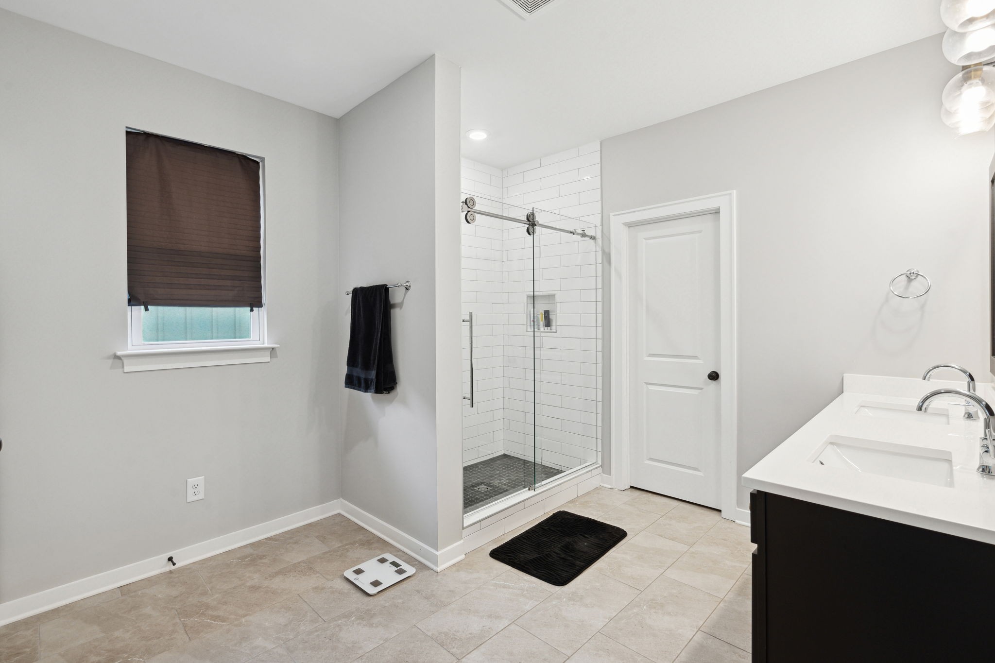 847 Plowson Road Mount Juliet, TN 37122 - Photo 22 of 56 a bathroom with a shower sink and mirror