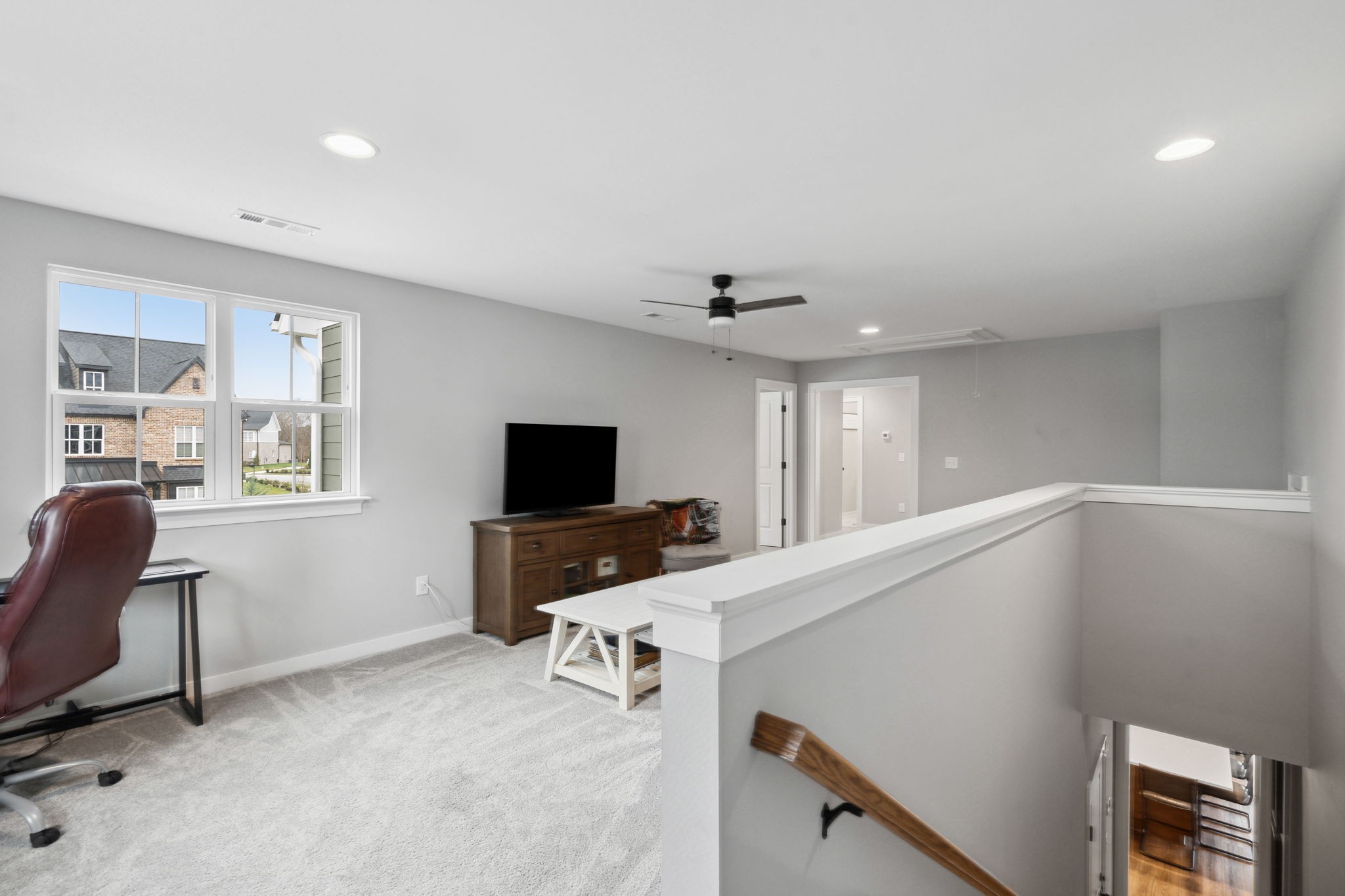 847 Plowson Road Mount Juliet, TN 37122 - Photo 23 of 56 a living room with furniture and a flat screen tv