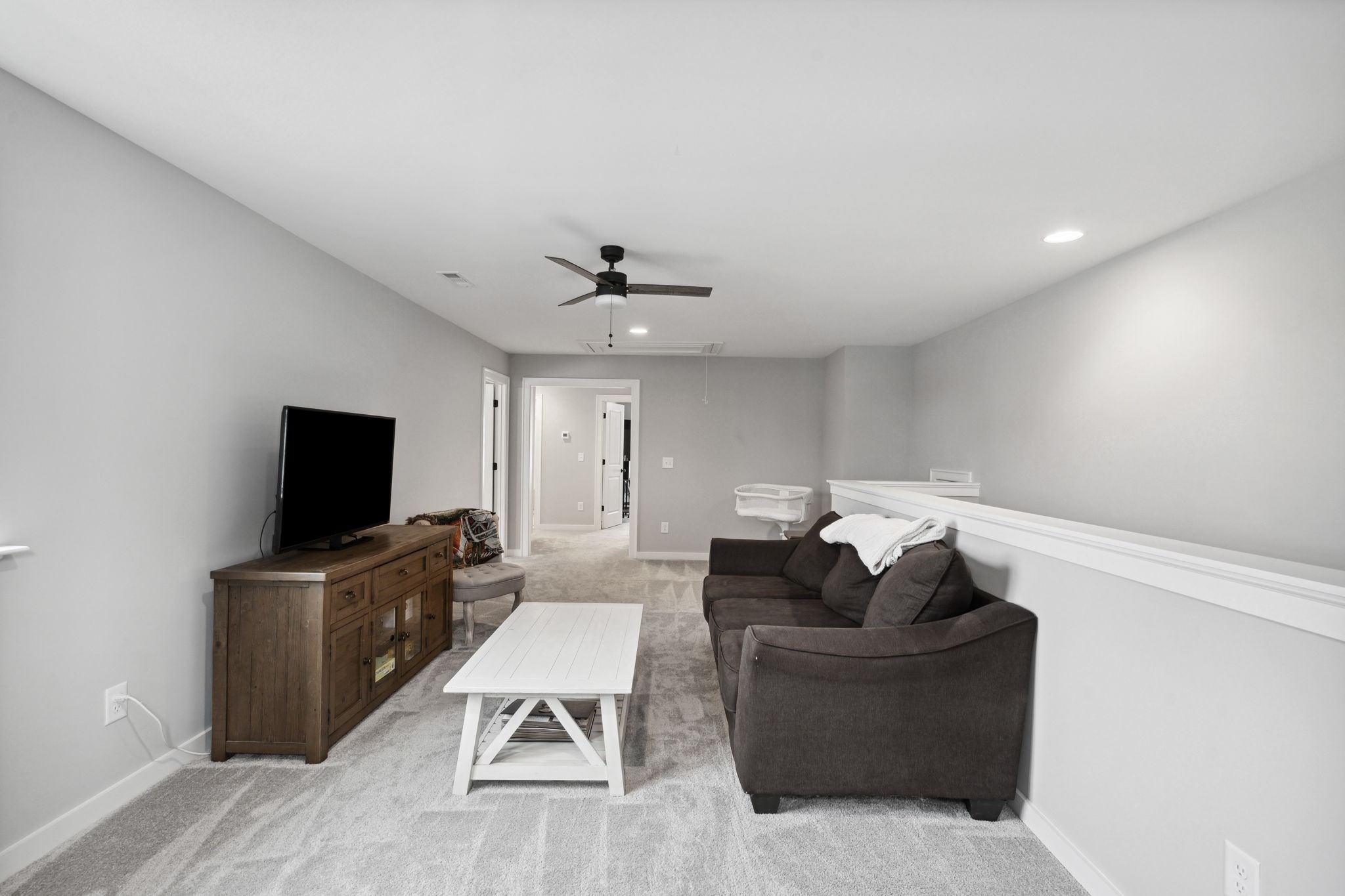 847 Plowson Road Mount Juliet, TN 37122 - Photo 24 of 56 a living room with furniture and a flat screen tv
