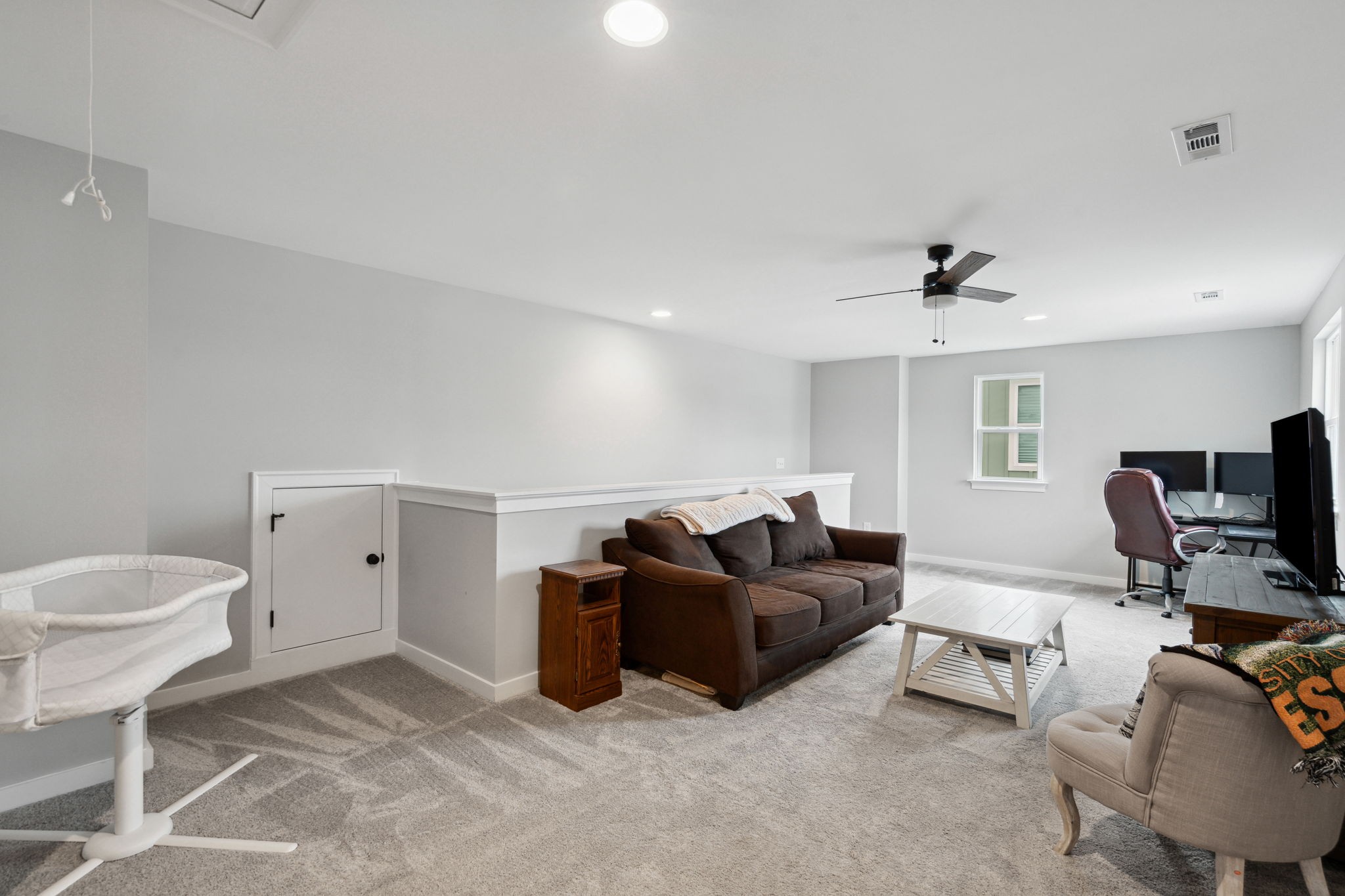 847 Plowson Road Mount Juliet, TN 37122 - Photo 25 of 56 a living room with furniture and a flat screen tv