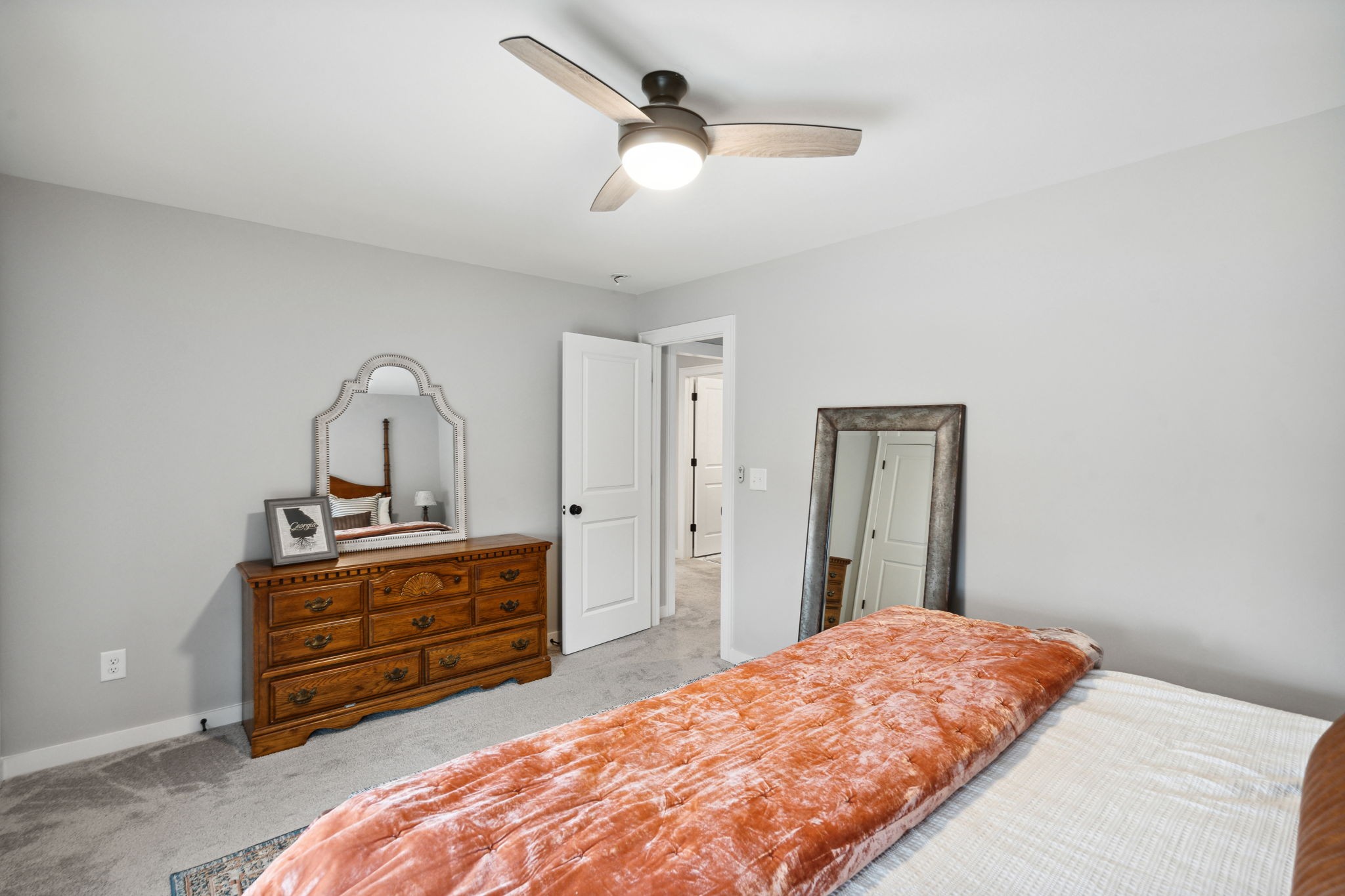 847 Plowson Road Mount Juliet, TN 37122 - Photo 27 of 56 a bedroom with a bed and a dresser