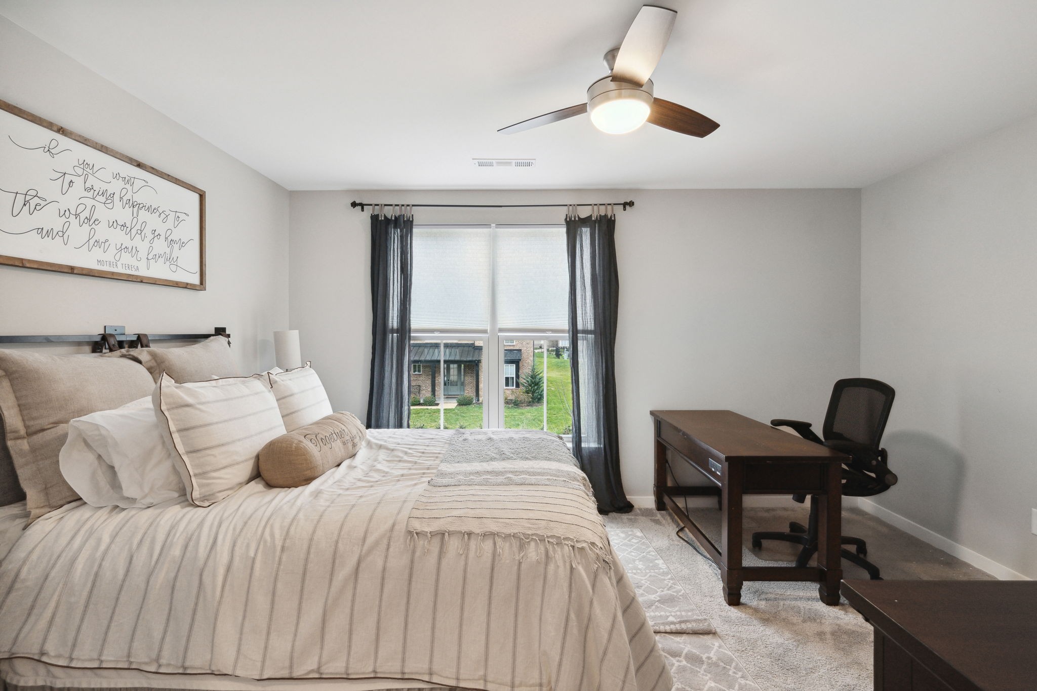 847 Plowson Road Mount Juliet, TN 37122 - Photo 32 of 56 a bedroom with a bed and a window