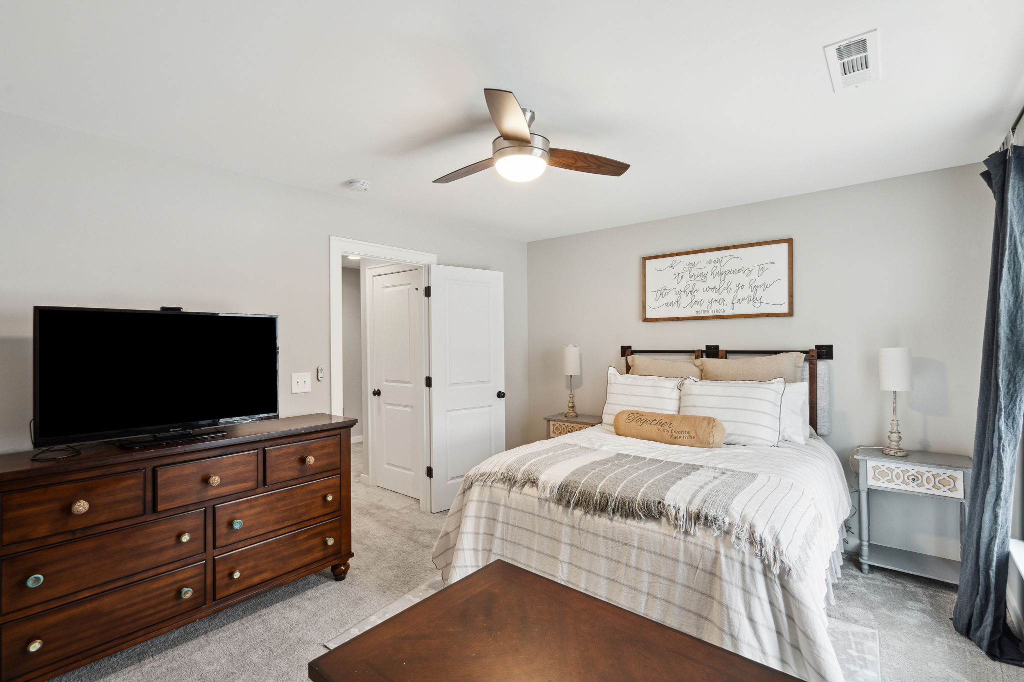 847 Plowson Road Mount Juliet, TN 37122 - Photo 33 of 56 a bedroom with a bed and a flat screen tv