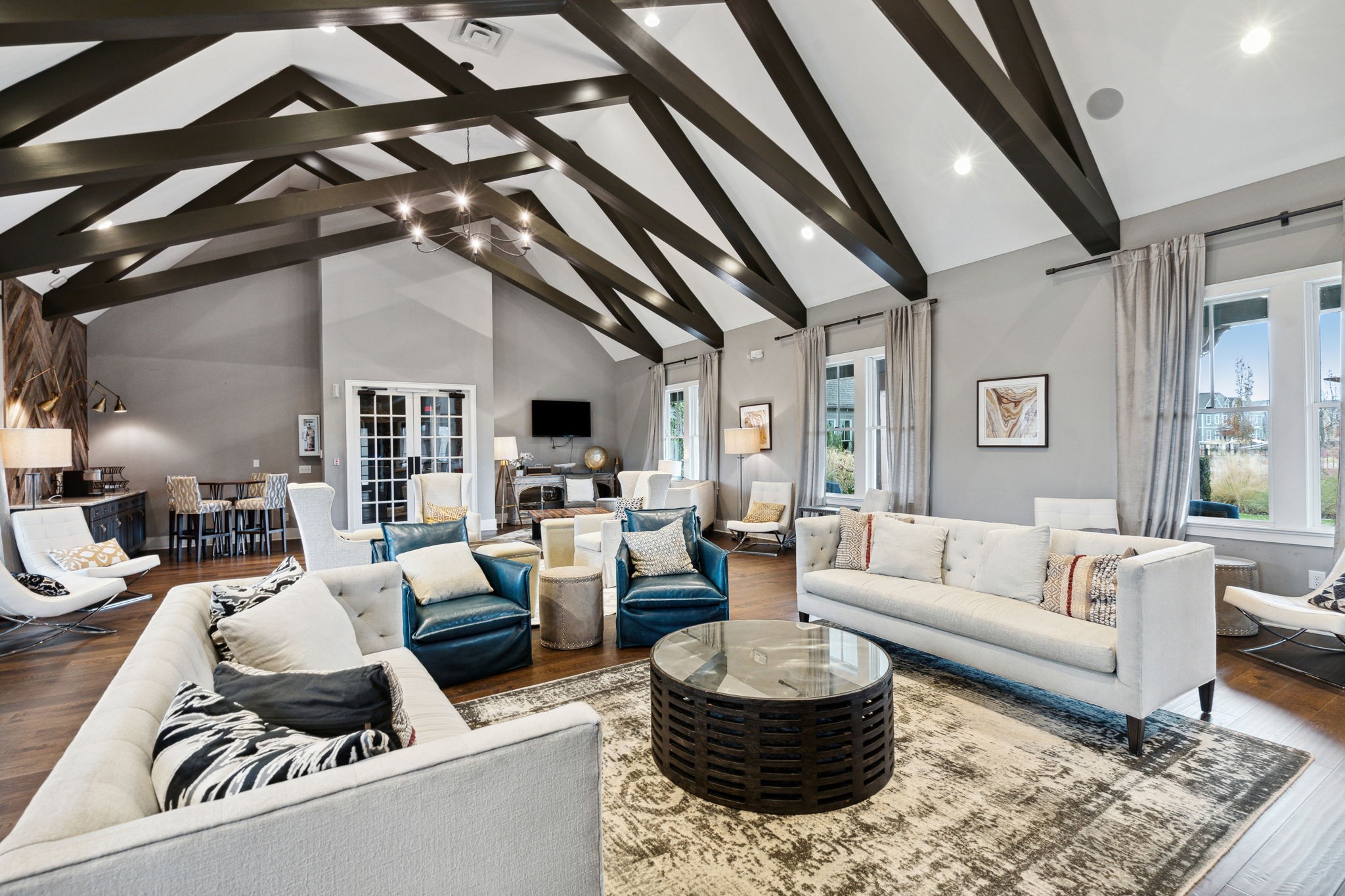 847 Plowson Road Mount Juliet, TN 37122 - Photo 53 of 56 a living room with furniture and a chandelier