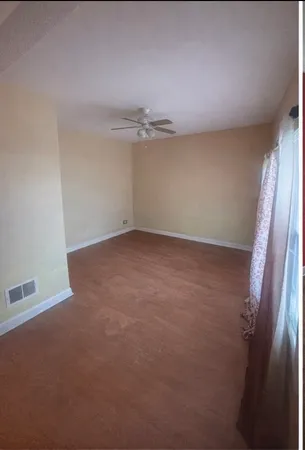 an empty room with a door