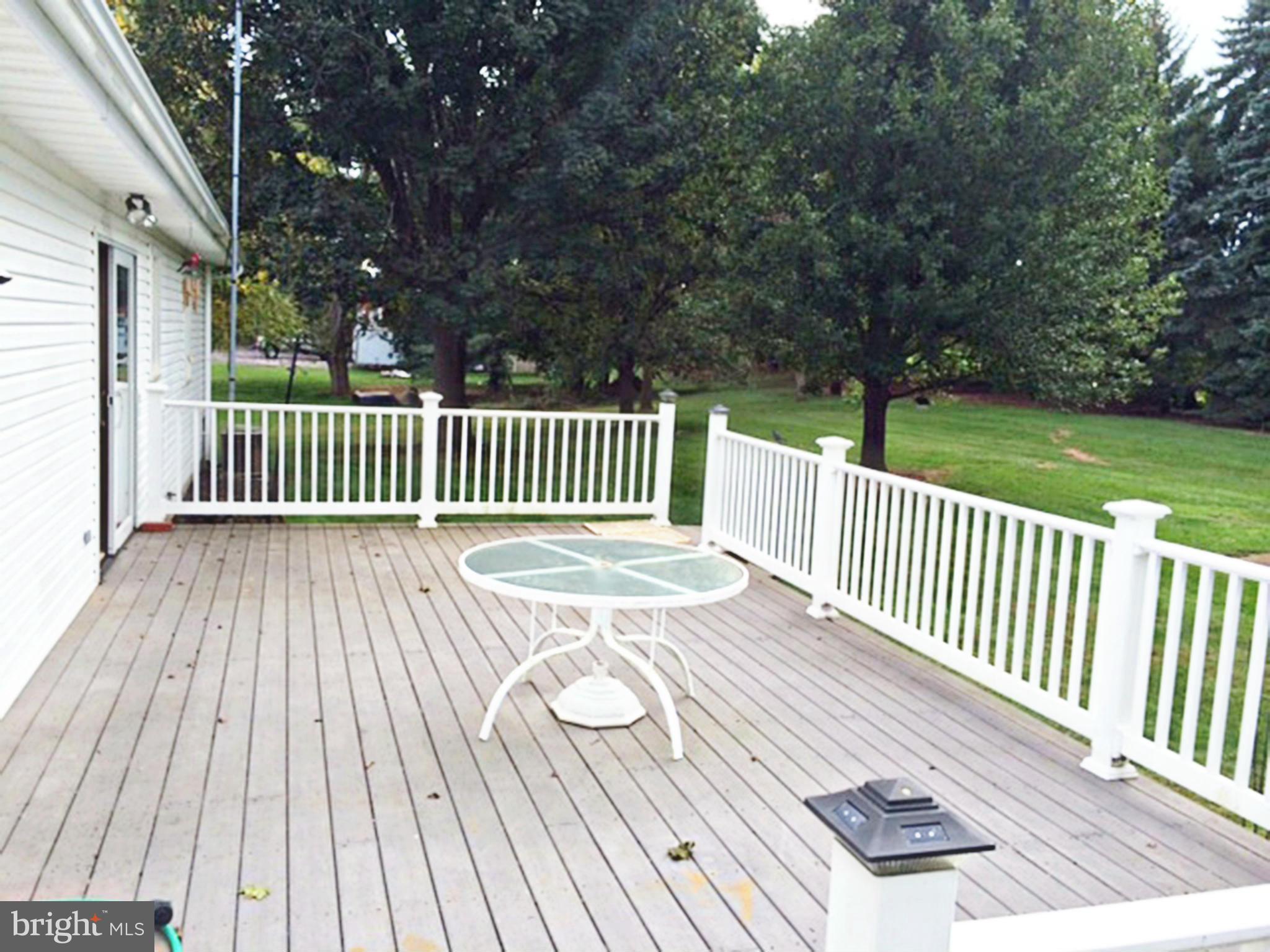 2256 Old Washington Road Westminster, MD 21157 - Photo 6 of 9 a view of balcony with wooden floor and fence
