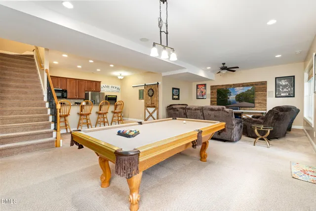 a view of a dining room with furniture