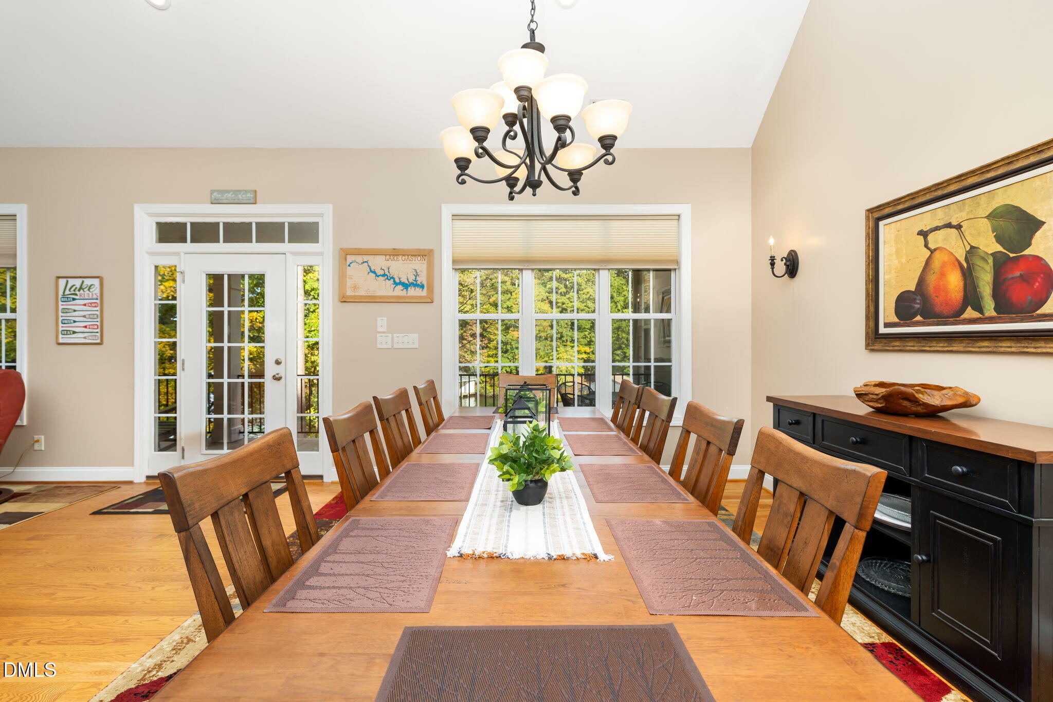 140 Breezewood Road Boydton, VA 23917 - Photo 24 of 87 a dining room with wooden floor and a chandelier