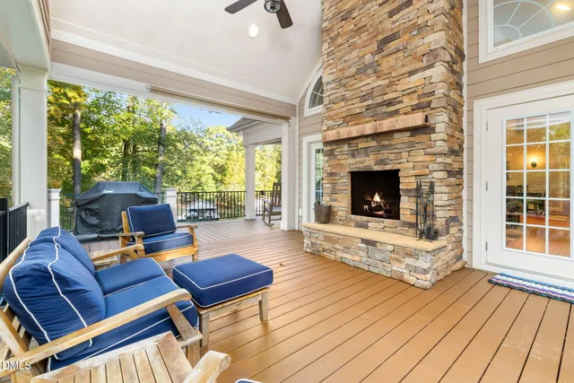 a view of a balcony with wooden floor