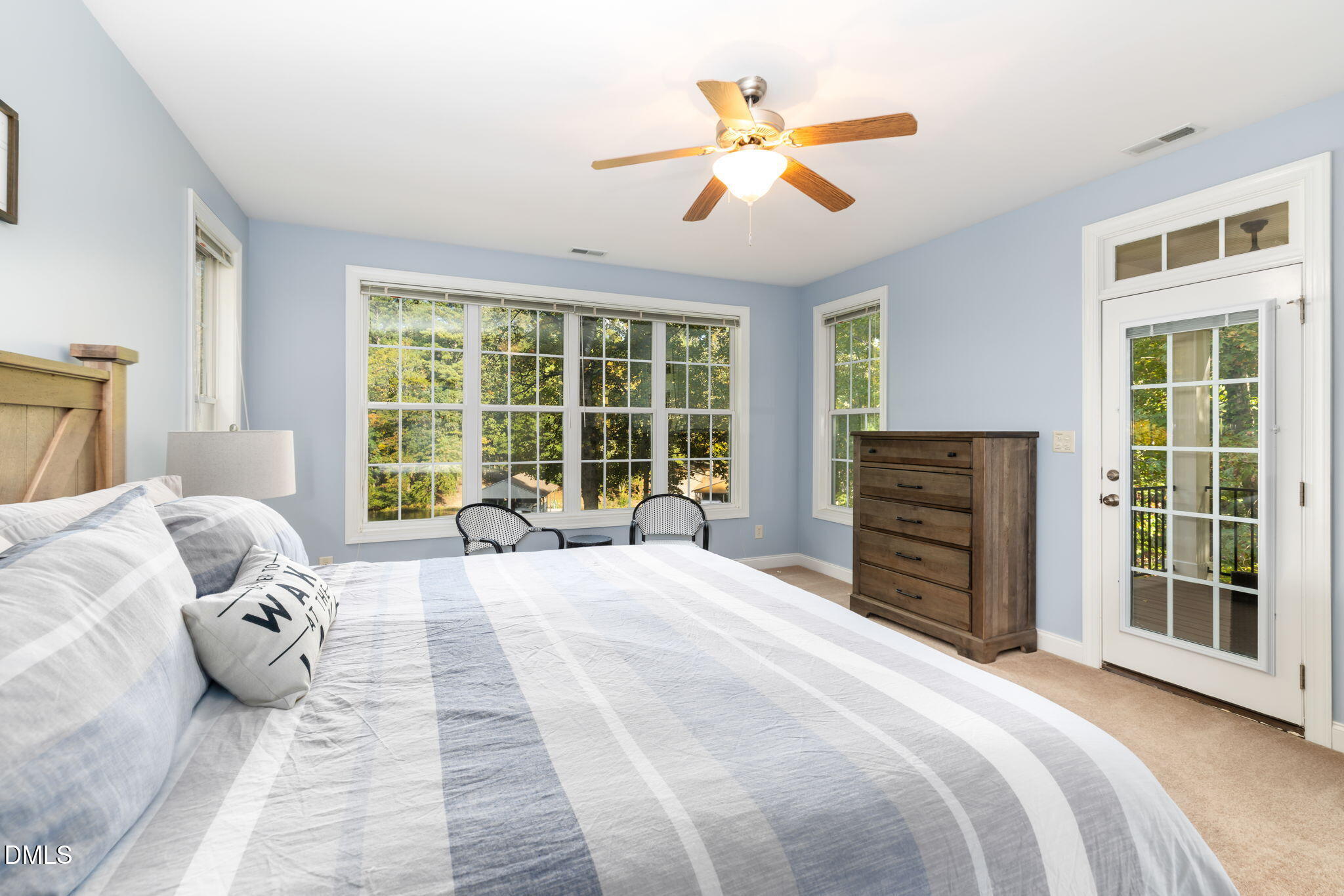 140 Breezewood Road Boydton, VA 23917 - Photo 31 of 87 a bedroom with a large bed and a large window